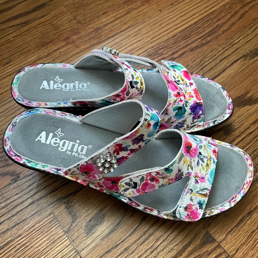 Alegria floral slides with rhinestone flower.